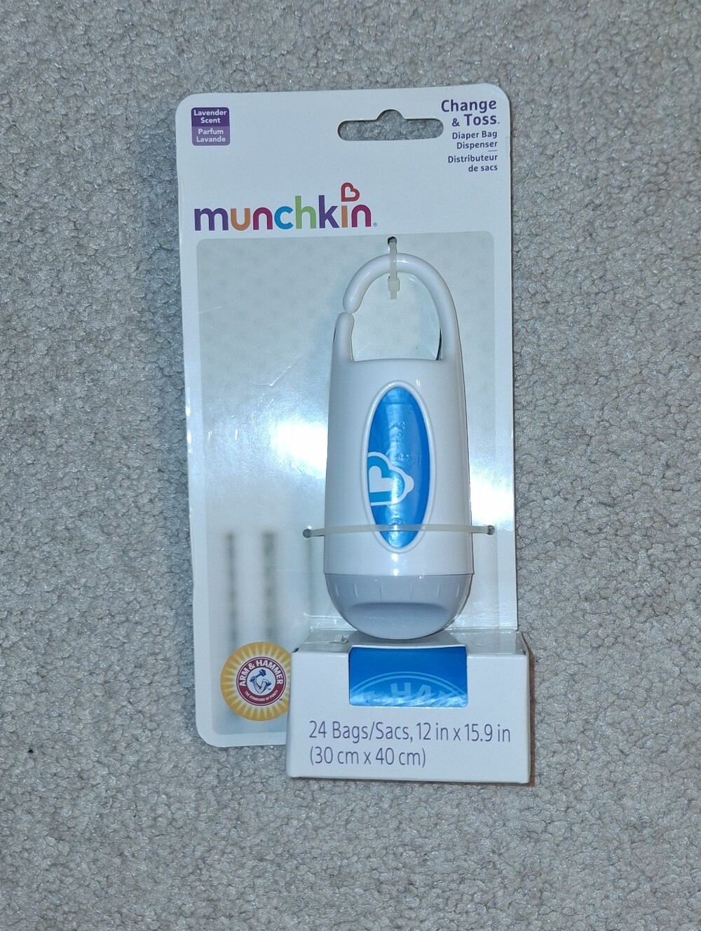 New, unopened Munchkin White and Blue Clip-On Diaper Bag Dispenser with Refill